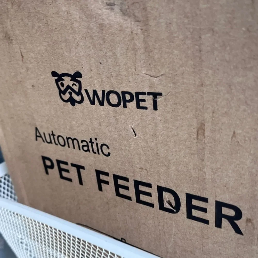 White and‎ Black Dog Feeder with Automatic Dispensing